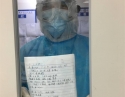 18、川北医学院附属医院第二批援湖北医疗队队员龚宗炼与隔离病